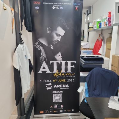 Vertical event poster with a black-and-white portrait and text including “ATIF” and event details.
